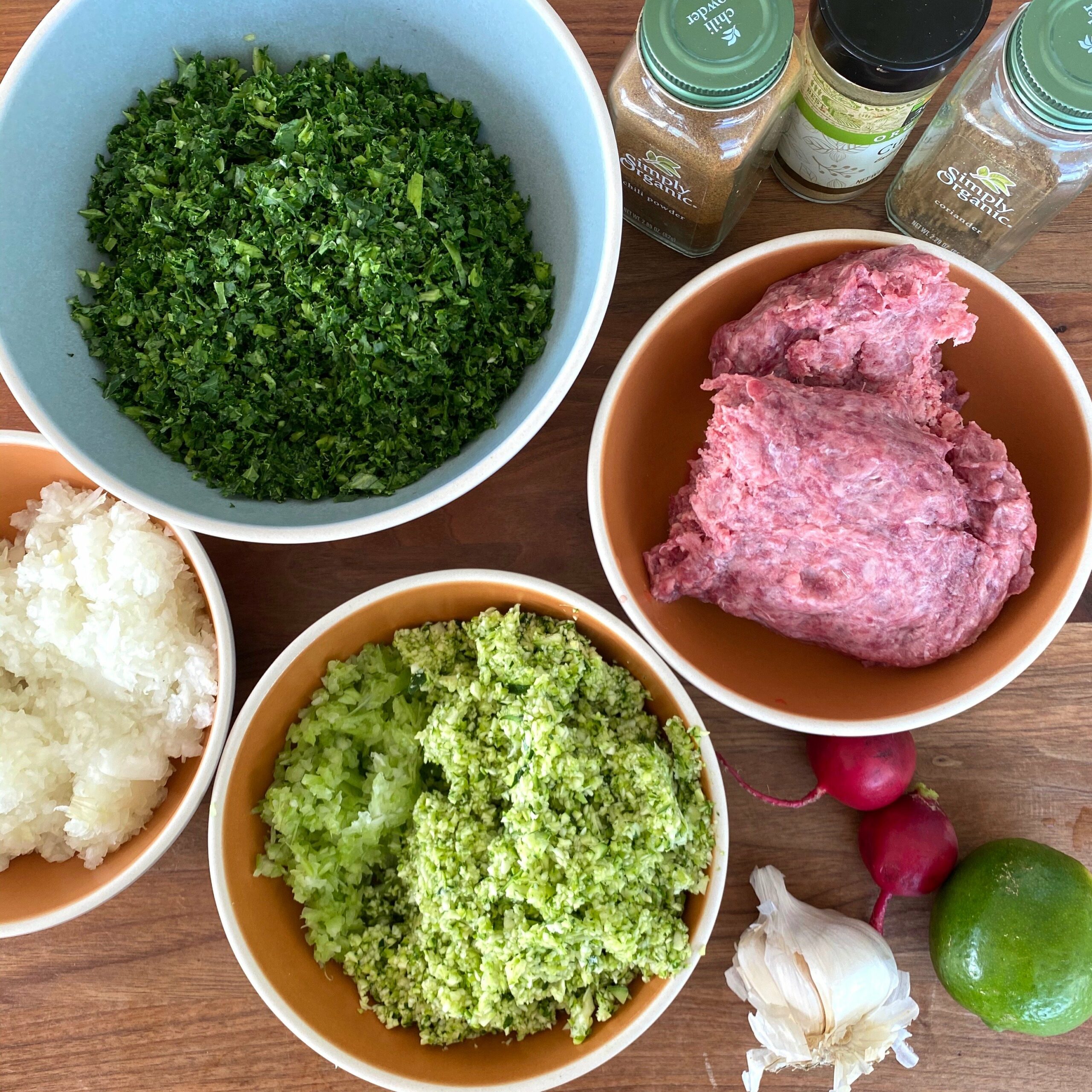 Ground beef tacos that include veggies like onion, celery, zucchinis, kale, broccoli stems, wilted leafy greens, leftover bell pepper, eggplant and mushrooms